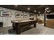 Finished basement with pool table and a comfortable seating area at 11925 Piney Glade Rd, Noblesville, IN 46060