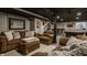 Finished basement with comfortable seating, pool table, and bar area at 11925 Piney Glade Rd, Noblesville, IN 46060