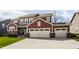 Attractive two-story home features a spacious driveway leading to an attached two-car garage at 11925 Piney Glade Rd, Noblesville, IN 46060