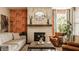 Inviting living room features a fireplace, comfortable seating, and stylish decor, making it ideal for relaxation at 11925 Piney Glade Rd, Noblesville, IN 46060