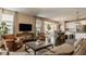 Open-concept living room flows seamlessly into the dining area and kitchen, perfect for entertaining at 11925 Piney Glade Rd, Noblesville, IN 46060