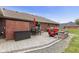 Backyard patio area features a seating area and a charcoal grill at 12129 N Cedarview Dr, Mooresville, IN 46158