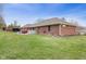 Exterior shot shows house has a patio and large backyard at 12129 N Cedarview Dr, Mooresville, IN 46158