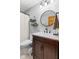 Stylish bathroom with a marble vanity, decorative mirror, and a neutral color scheme at 12129 N Cedarview Dr, Mooresville, IN 46158