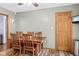Comfortable dining area featuring a wooden table with chairs and neutral wall colors at 12129 N Cedarview Dr, Mooresville, IN 46158