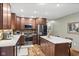 Modern kitchen with stainless steel appliances, granite countertops, and an island with seating at 12129 N Cedarview Dr, Mooresville, IN 46158