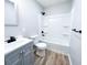 Clean and modern bathroom with new fixtures and stylish gray vanity at 1246 Mcdougal St, Indianapolis, IN 46203