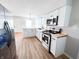 Well-appointed kitchen featuring stainless steel appliances and butcher block countertops at 1246 Mcdougal St, Indianapolis, IN 46203