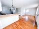 Bright living room featuring hardwood floors, fresh paint, and abundant natural light at 1246 Mcdougal St, Indianapolis, IN 46203
