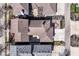 An aerial view of rooftops, yards and neighborhood streets showcasing the home's location at 12569 Branford St, Carmel, IN 46032