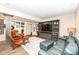 Entertainment space with comfortable seating, a large entertainment center, and a relaxing ambiance at 12569 Branford St, Carmel, IN 46032