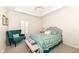 Serene bedroom with shiplap accent wall, a sitting area, and neutral decor at 12569 Branford St, Carmel, IN 46032