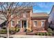Charming brick home with well-manicured landscaping and a welcoming front entrance at 12569 Branford St, Carmel, IN 46032