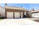 A detached two car garage boasts an extra parking pad and tasteful landscaping at 12569 Branford St, Carmel, IN 46032