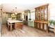 Stylish kitchen with large island, stainless steel appliances, and custom wooden cabinets at 12569 Branford St, Carmel, IN 46032