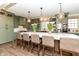 Spacious kitchen with large island, stylish pendant lights, and modern appliances at 12569 Branford St, Carmel, IN 46032