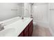 Bathroom with double sink vanity with cherry wood cabinets, with a shower and toilet at 13820 N Honey Creek Dr, Camby, IN 46113