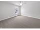Bedroom with neutral carpet, one window, ceiling fan and white trim at 13820 N Honey Creek Dr, Camby, IN 46113