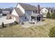 Aerial view of backyard patio with outdoor dining and lounge furniture at 13947 Morningtide Cir, Fishers, IN 46038