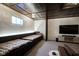 Basement offers built-in seating, a entertainment center, and natural light from the lone window at 13947 Morningtide Cir, Fishers, IN 46038