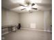 Finished basement with neutral carpeting, desk, and golf clubs at 13947 Morningtide Cir, Fishers, IN 46038