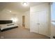 Spacious bedroom with plush carpet, double closets, and an open view to a bathroom at 13947 Morningtide Cir, Fishers, IN 46038