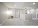 Well-lit hallway with carpeted floors and plenty of space for moving around the house at 13947 Morningtide Cir, Fishers, IN 46038