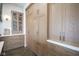 Charming kitchen showcases custom cabinetry, ample counter space, and a pantry at 13947 Morningtide Cir, Fishers, IN 46038