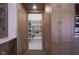 Walk-in pantry showcasing organized shelving for ample storage at 13947 Morningtide Cir, Fishers, IN 46038
