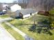 Charming home with well-maintained lawn, complemented by mature trees and a driveway at 1405 Creekside Dr, Brownsburg, IN 46112