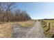 Paved path leading toward a bridge, ideal for walking and enjoying the outdoors at 1405 Creekside Dr, Brownsburg, IN 46112