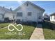 Back of house with access through door and level backyard, easy access at 1405 N Mount St, Indianapolis, IN 46222