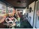 Relaxing front porch adorned with plants and seating offers an inviting outdoor living space at 1405 N Mount St, Indianapolis, IN 46222