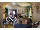 Cozy living room featuring an archway, ceiling fan, and natural light at 1405 N Mount St, Indianapolis, IN 46222