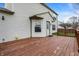 Spacious stained back deck perfect for entertaining with siding and a view of the backyard at 15192 Porchester Dr, Noblesville, IN 46062