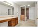 Bathroom featuring a vanity with a mirror and a tiled shower and tub at 15192 Porchester Dr, Noblesville, IN 46062