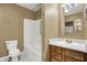 Bathroom with toilet, tub, and wooden vanity with sink at 15192 Porchester Dr, Noblesville, IN 46062