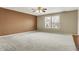 Spacious bedroom with soft carpeting, neutral walls, and natural light, offering a tranquil retreat for relaxation at 15192 Porchester Dr, Noblesville, IN 46062
