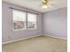 Bedroom with carpet flooring, ceiling fan, and large window at 15192 Porchester Dr, Noblesville, IN 46062