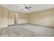 Bedroom showcasing a ceiling fan and large window at 15192 Porchester Dr, Noblesville, IN 46062