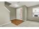 Inviting entryway featuring hardwood floors, a staircase, and a bright front door, creating a warm welcome at 15192 Porchester Dr, Noblesville, IN 46062