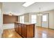 Functional kitchen island connecting the kitchen and living areas, ideal for meal prep and entertaining guests at 15192 Porchester Dr, Noblesville, IN 46062
