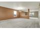 Expansive living room offering abundant natural light, plush carpeting, and seamless transitions for flexible design at 15192 Porchester Dr, Noblesville, IN 46062