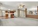 Bright, open-concept living space featuring a kitchen, living room, and dining area, excellent for Gathering gatherings at 15192 Porchester Dr, Noblesville, IN 46062