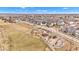 Neighborhood with sidewalks, green space, and a playground, from an aerial view at 1521 Avondale Dr, Westfield, IN 46074