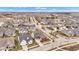 Wide aerial shot showcases a neighborhood with well-spaced homes and tree-lined streets at 1521 Avondale Dr, Westfield, IN 46074