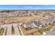High-angle view of a neighborhood with homes, streets, and open community spaces at 1521 Avondale Dr, Westfield, IN 46074