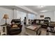 Finished basement with multiple living areas and recreation space with pool table in background at 1521 Avondale Dr, Westfield, IN 46074