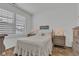 Cozy bedroom featuring a window with shutters, and a white comforter at 1521 Avondale Dr, Westfield, IN 46074