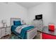 Cozy bedroom featuring wood-look flooring and a television atop a white chest of drawers at 1521 Avondale Dr, Westfield, IN 46074